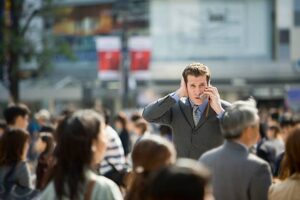Crowd of Americans looking at each other suspiciously