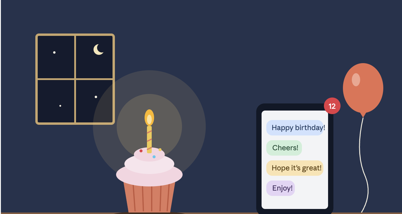 A single birthday cupcake with a lit candle beside a phone showing birthday messages